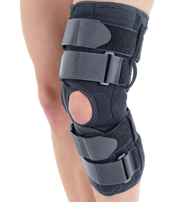 Orteză de genunchi mobilă cu suport patelar și articulaţii laterale TRIAGEN EXTRA