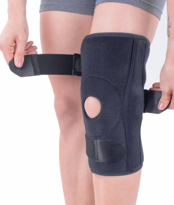 Orteză genunchi mobilă cu articulații metalice laterale