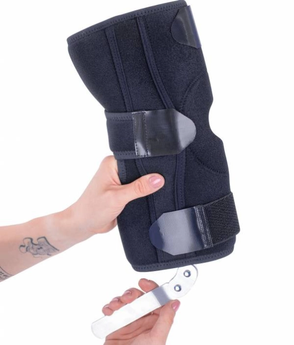 Orteză genunchi mobilă cu articulații metalice laterale